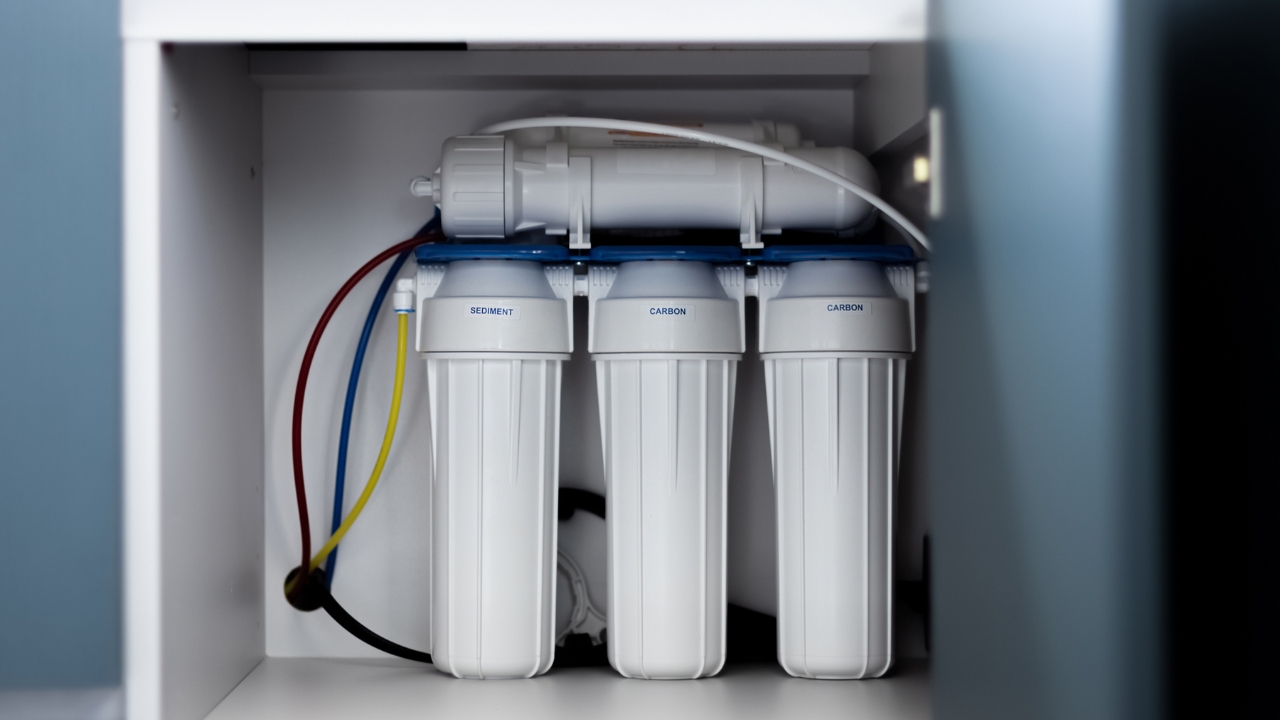 In line water filter under counter Under-sink reverse osmosis water filtration system installed by Charter Oak Plumbing for clean drinking water.